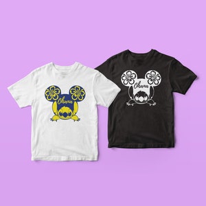 May include: Two t-shirts with a blue Stitch character wearing yellow flower Mickey Mouse ears. The text "Ohana" is on the shirt. One shirt is white and the other is black.