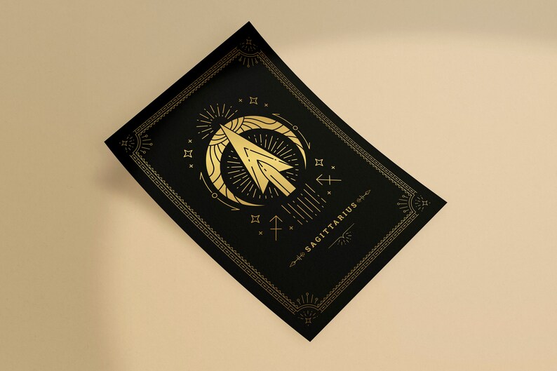 May include: A black and gold poster with a stylized illustration of the Sagittarius zodiac sign. The sign is depicted as an arrow with a crescent moon and stars. The text "SAGITTARIUS" is written in gold lettering.