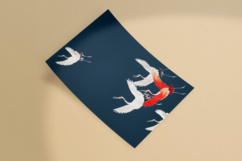 May include: A navy blue print featuring white and red cranes in flight. The birds are depicted with detailed wings and long legs, set against a dark background. The artwork has an Asian-inspired aesthetic.