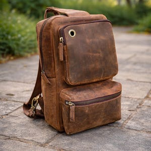 distressed leather sling backpack Medium Brown Bag Backpack has a zip closure Concealed Carry Unisex Taylor Sling
