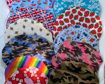 Duschfester Fahrradsitz Bezug: Regenbogen, Bienen, Hawaiianer, Camo Prints