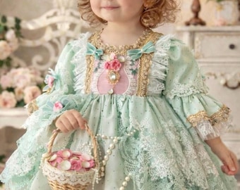 Vestido de encaje verde menta para bebé niña, estilo vintage, ideal para cumpleaños de niñas pequeñas.
