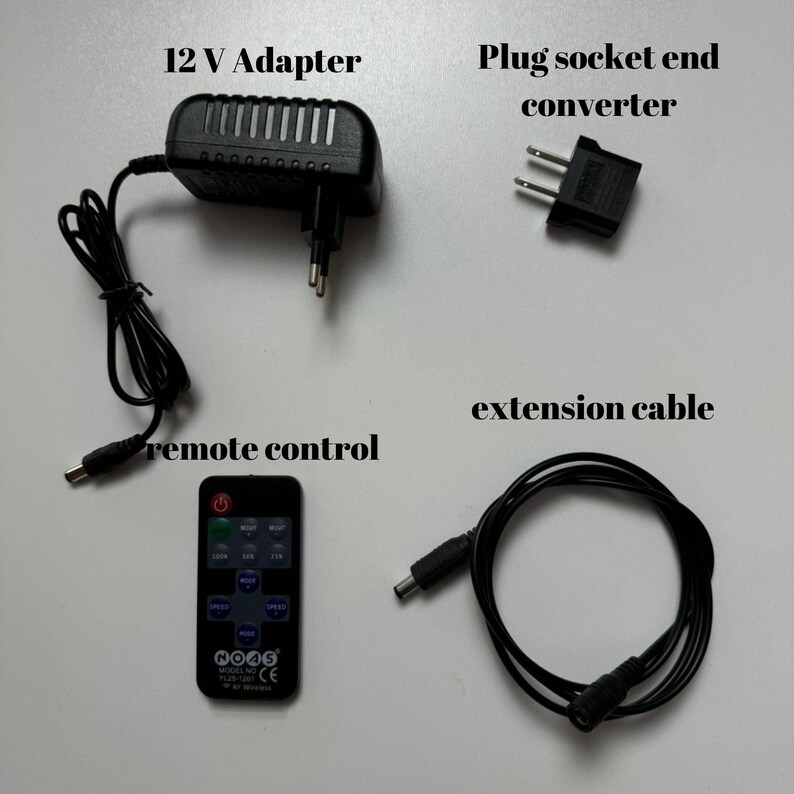 May include: A black 12V adapter with a power cord, a black plug socket end converter, a black extension cable, and a black remote control with buttons for speed, mode, and brightness.
