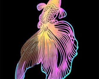 May include: A single iridescent fish-shaped earring with a gold-colored hook. The fish has intricate cut-out details, with a body that transitions from yellow to pink and purple. The background is solid black.