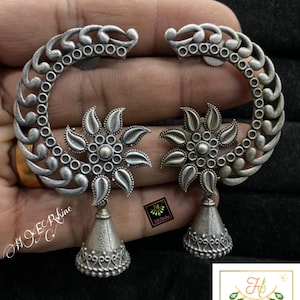 Silver Toned Half Moon Flowery jhumkis, Silver Look Alike Oxidised Hand crafted Latest Trendy Designer Brass Earrings Jhumka_weddings/party