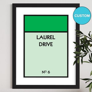 May include: A framed print with a green and light green background. The text "LAUREL DRIVE No 6" is printed in black.