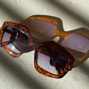 Nell Sunglasses shades eyewear eyeshades sunblockers