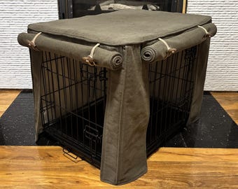 Dog crate covers made to measure in a dark forest green cotton linen union fabric with a full cotton rich lining