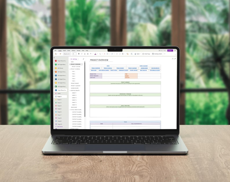 May include: A dark gray laptop displaying a digital project overview document on its screen. The document features a table with headers including Project Overview, Project Timeline, and Project Summary, with a sidebar listing various project files.
