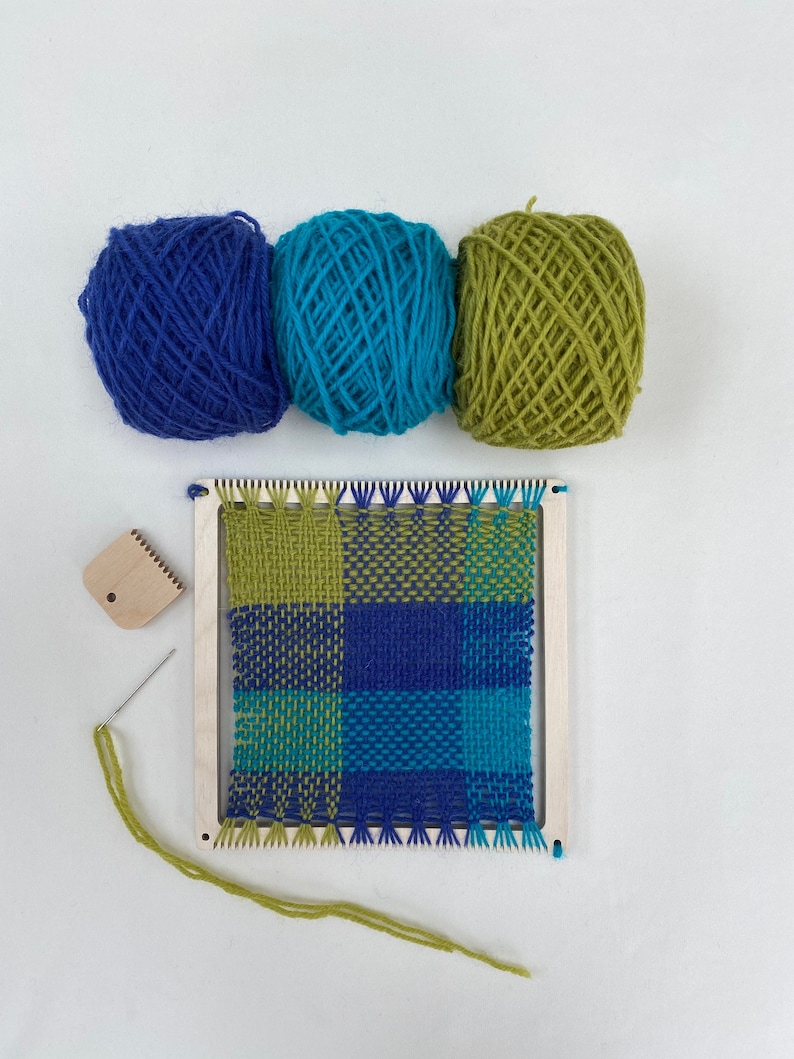 Square frame weaving kit with blue, green and turquoise yarn