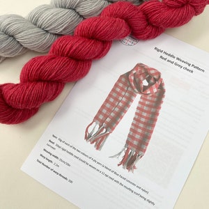 May include: Red and grey yarn skeins for weaving a scarf. The pattern instructions include the yarn type, reed size, weaving width, warp length, and total number of warp threads.