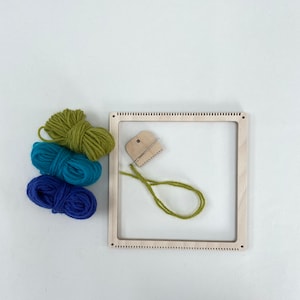 Square frame weaving kit with blue, green and turquoise yarn