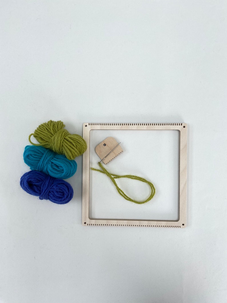 Square frame weaving kit with blue, green and turquoise yarn