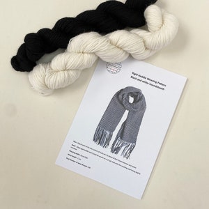 May include: Black and white yarn for weaving a houndstooth scarf. The yarn is 50g each of two colors and is ready to be woven on a 12-dent rigid heddle loom. The pattern includes instructions for weaving a scarf with fringe.