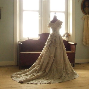 1860's rustic linen ball gown or court dress with flowers, petals and silk ribbons.