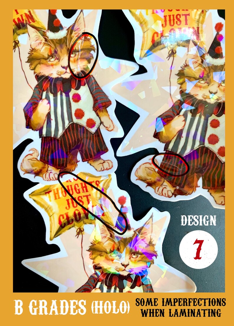 K&ouml;nnte beinhalten: Ein Set mit drei holografischen Aufklebern, die eine Comic-Katze zeigen, die als Clown verkleidet ist und einen Ballon h&auml;lt. Die Ballons haben den Text "I'm Just Clowning" und "My Thoughts Just Clowning". Die Aufkleber sind mit "B Grades (Holo)" und "Design 7" gekennzeichnet.