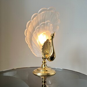 Italian Table Lamp in the shape of a peacock with Murano glass as a lampshade, made in the 1970s, Hollywood Regency style