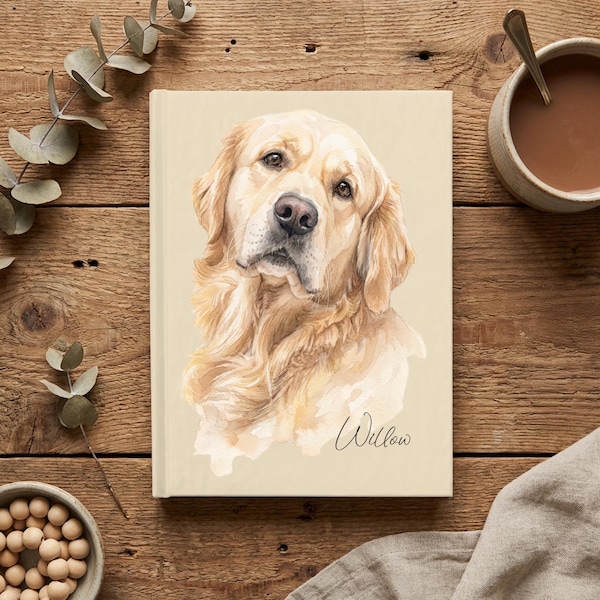 May include: A hardcover book with a cream-colored cover featuring a detailed watercolor illustration of a golden retriever dog. The name Willow is written in elegant black cursive script below the dog portrait on the front cover.