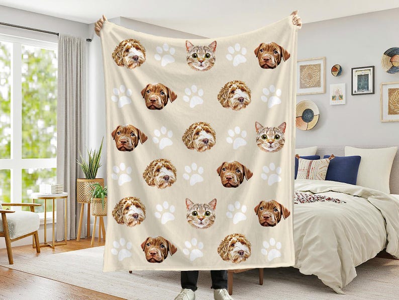 Cozy beige blanket featuring adorable portraits of dogs and cats interspersed with white paw prints. A personalized pet photo blanket displayed in a stylish bedroom setting, perfect for animal lovers.