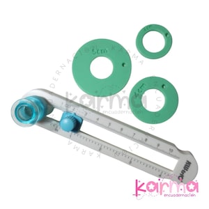 May include: A white circle cutter with a blue knob and a clear plastic guide. The cutter has a ruler marked in inches. There are three green plastic circle templates with the following diameters: 4 cm, 5 cm, and 7 cm.