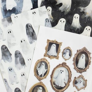 May include: A collection of Halloween-themed paper sheets featuring watercolor illustrations of ghosts in various styles. Some sheets have repeating ghost patterns, while others showcase ghosts in ornate gold frames.