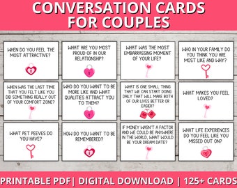 May include: A set of printable conversation cards for couples. The cards are white with pink hearts and keys. The cards feature questions to spark conversation and get to know each other better. The text on the cards includes phrases like "When do you feel the most attractive?" and "What are you most proud of in our relationship?"
