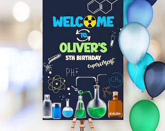 May include: A blue and green welcome sign for a 5th birthday party with the text "Welcome to Oliver's 5th Birthday Experiment". The sign features a science theme with beakers, test tubes, and chemical formulas.
