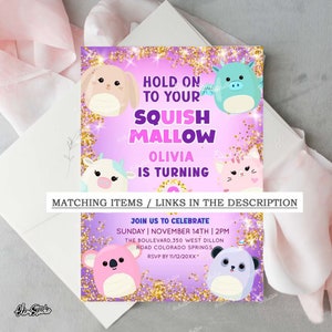 May include: Purple birthday invitation with gold glitter and a pink, blue, and white squishmallow character. The invitation says "Hold on to your Squishmallow Olivia is turning" and includes the date, time, and location of the party.