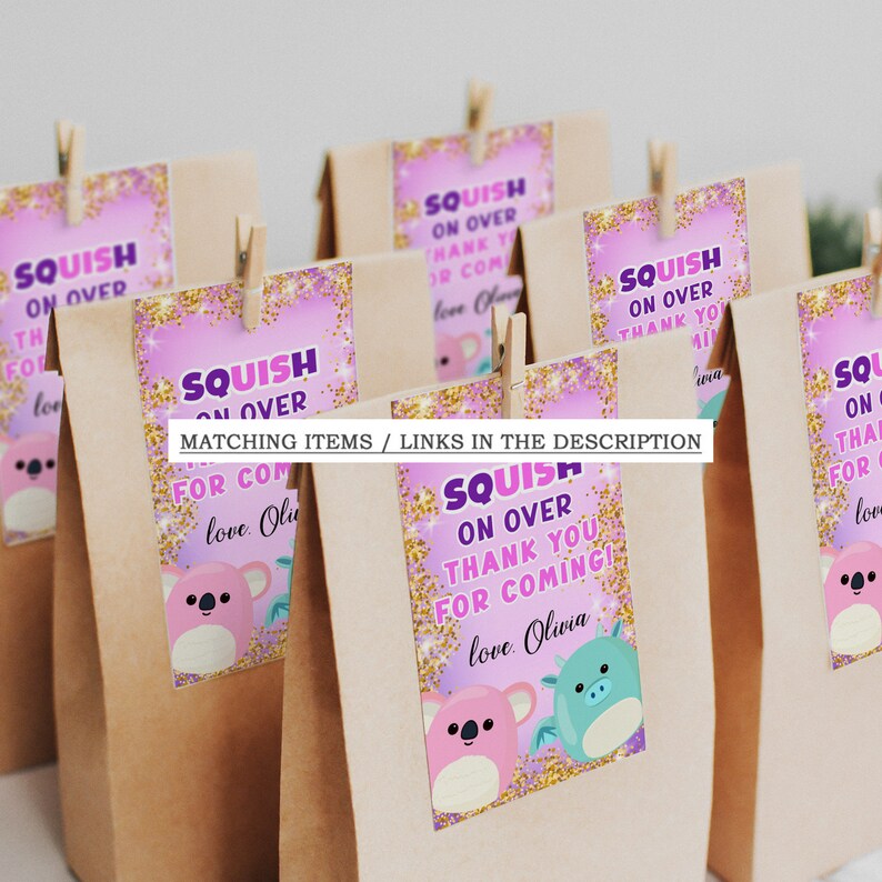 May include: Pink and purple favour bags with a gold glitter background. The bags have a sticker with a koala and a dragon, and the text "Squish On Over Thank You For Coming! Love Olivia".