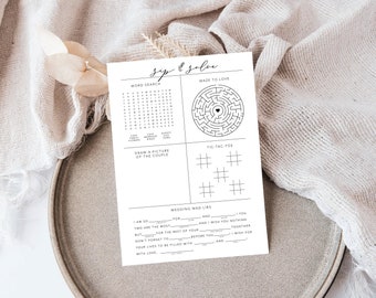 Könnte beinhalten: Ein druckbares Hochzeitsspiel mit vier Aktivitäten: Wortsuche, Labyrinth, Tic-Tac-Toe und Hochzeit-Mad Libs. Das Spiel ist auf weißem Papier mit schwarzer Tinte gedruckt.