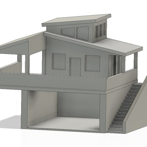 May include: A grey model of a two-storey house with a flat roof, a balcony, and a set of stairs leading up to the second floor.
