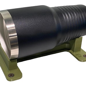 May include: A black and silver tumbler with a green plastic stand. The stand has the text "JDS 3D" printed on it.