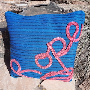 Solid blue with pink &quot;Rope&quot; applique retired rope throw pillow.