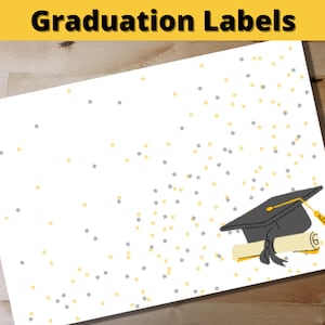 May include: White paper with scattered yellow and gray stars, featuring a graduation cap and diploma illustration. The text "Graduation Labels" is displayed in a yellow banner at the top. The design is suitable for graduation-themed crafts.