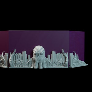 May include: A purple box with a 3D printed design of an octopus with tentacles on the front. The octopus is gray and has a textured surface.