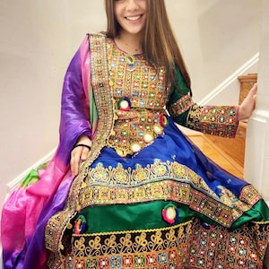 K Afghan Kuchi embroided dress including Shirt, trouser and Chaddar. Fits ages 20-40. Free shipping throughout U.S