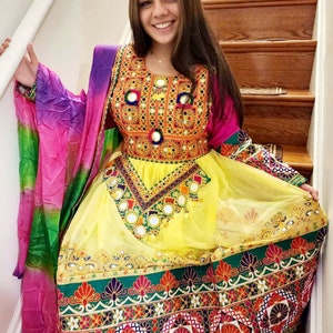 Afghan Kuchi embroided dress including Shirt, trouser and Chaddar. Fits ages 20-40. Free shipping throughout U.S