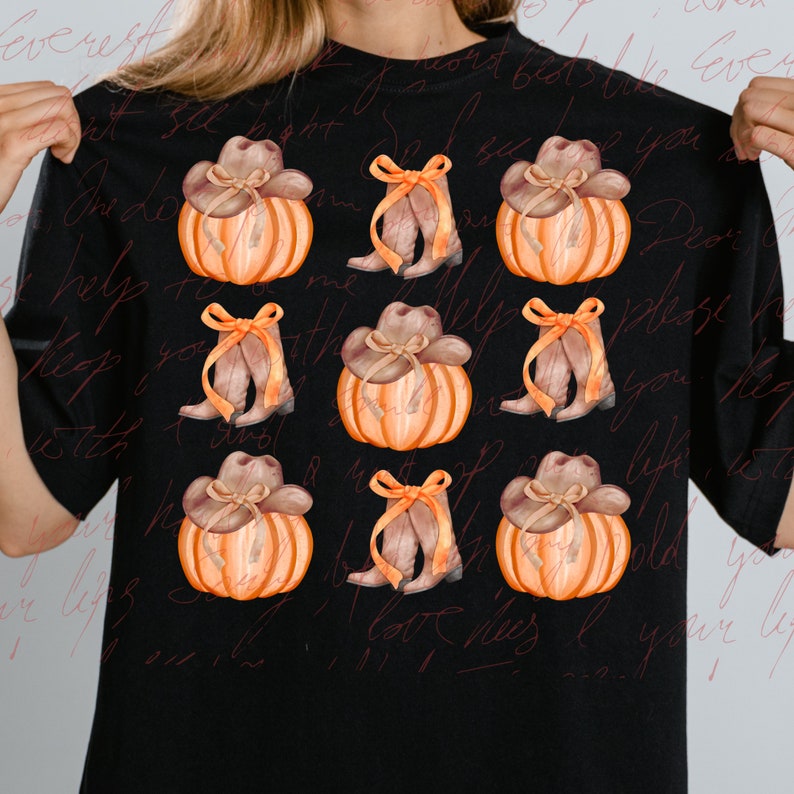 May include: A black t-shirt with a repeating pattern of orange pumpkins with brown cowboy hats and brown cowboy boots with yellow bows.