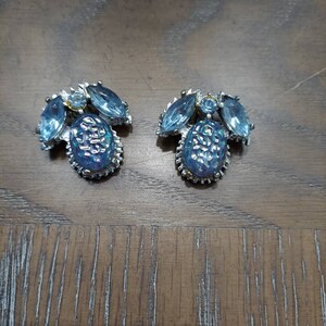 Vintage blue clip on earrings set in Silver tone metal.
