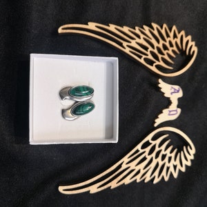 silver earing with stone