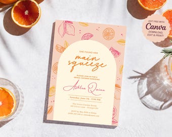 May include: A printable bridal shower invitation with a citrus theme. The invitation features a peach background with orange and yellow citrus fruits and leaves. The text reads "She found her main squeeze" and includes the bride's name, date, time, and location.