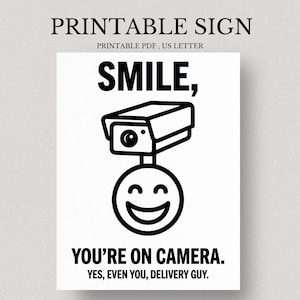 May include: Printable sign with the text "SMILE, YOU'RE ON CAMERA. YES, EVEN YOU, DELIVERY GUY." The design features a security camera above a smiling face. The sign is a printable PDF, US Letter size.