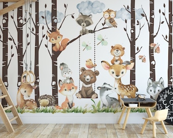May include: A white wall mural with a woodland theme featuring a variety of animals including a deer, bear, fox, owl, raccoon, and squirrel. The mural is set against a backdrop of brown birch trees. The text "Home of the Cool Kids" is written on a black chalkboard.
