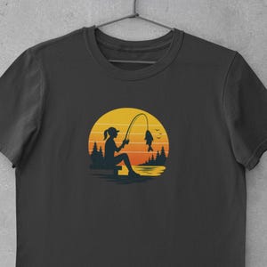 Fishing Woman Sunset Shirt, Female Angler Gift Tee, Lake Catch Outdoors Shirt, Fisherwoman Nature Tee, Unisex Fishing Tee