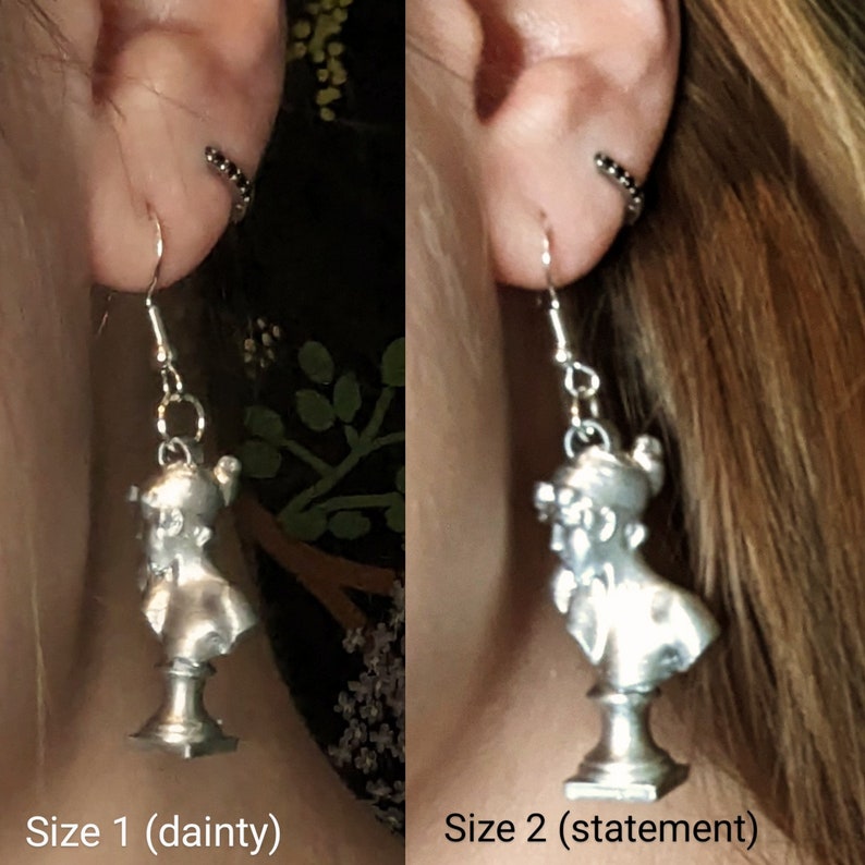 This photo shows a side-by-side of a blonde woman wearing a Sappho bust earring in the dainty size and the statement size.