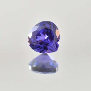 Zafiro suelto bicolor púrpura azul ciruela de Java AAA+ de 10 x 10 mm, certificado por GIT. Se utiliza para hacer anillos y colgantes. Piedra preciosa aciano.