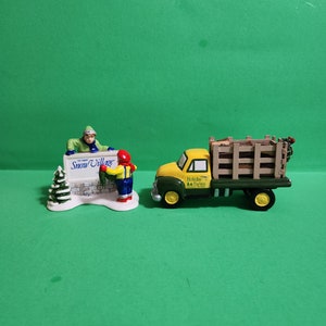 Set of 2 Porcelain Department 56 Village Accessories Featuring a Snow Village Sign and Firewood Truck  **Free Shipping**