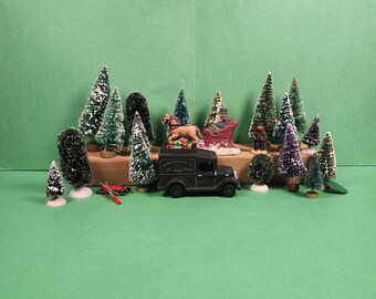 Juego de 21 figuras y accesorios para un pueblo navideño (Juego 97)