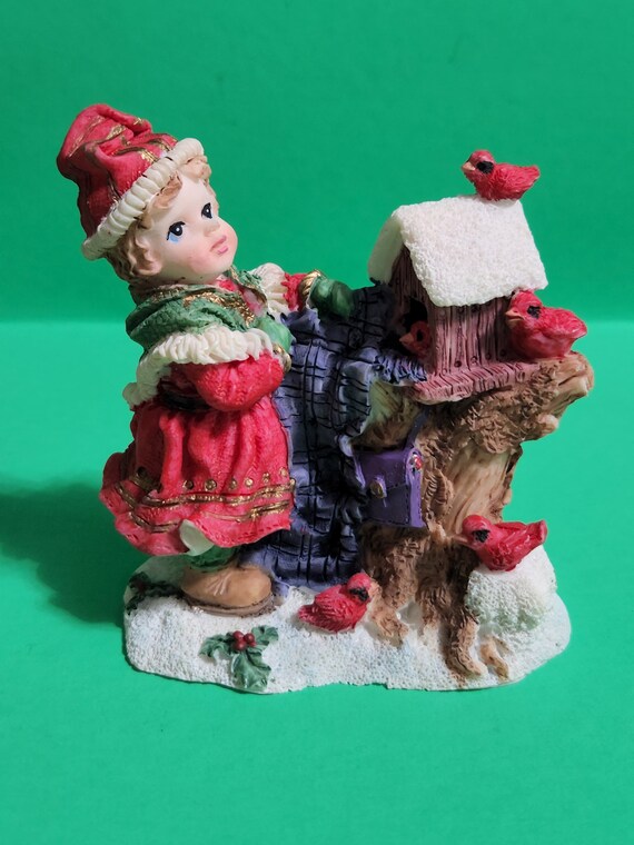 Set of 2 Mismatched Christmas Figurines, One is an Elf by a