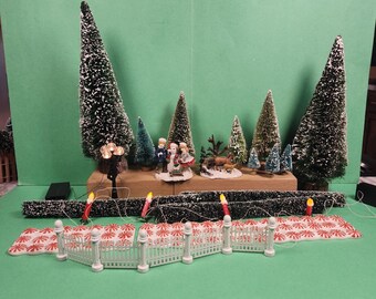 Juego de 20 figuras y accesorios para un pueblo navideño (Juego 94)